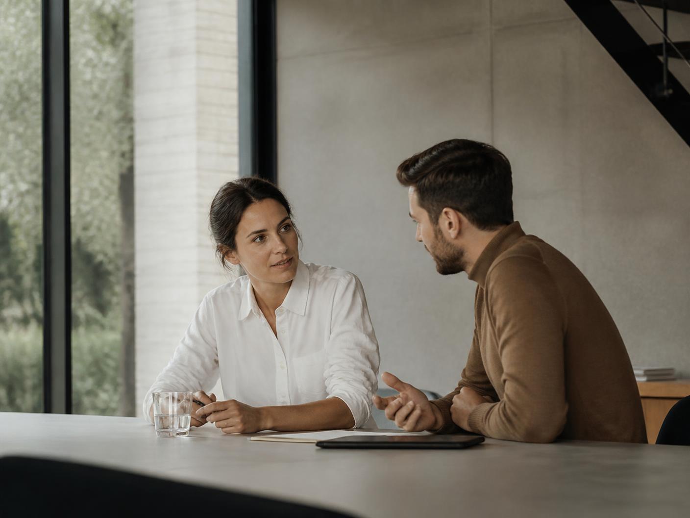 A small team working together in a bright, calm office